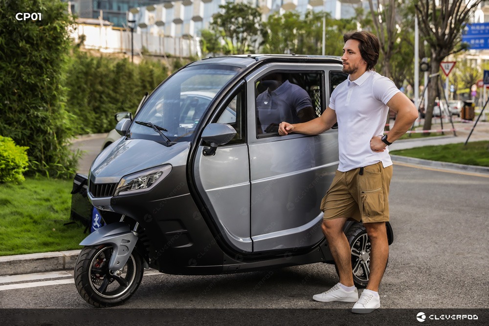 Cleverpod CP01 prototype, full three-wheeled enclosed delivery pod, photographed in a real urban setting.